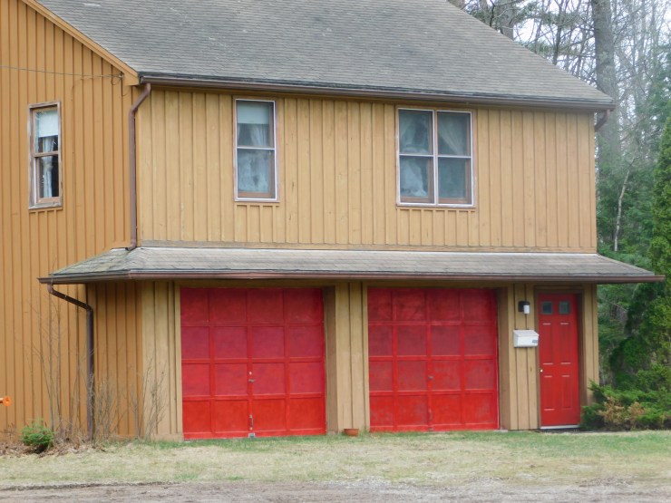 The Carriage House, a two car garage with a one bedroom apartment on top.