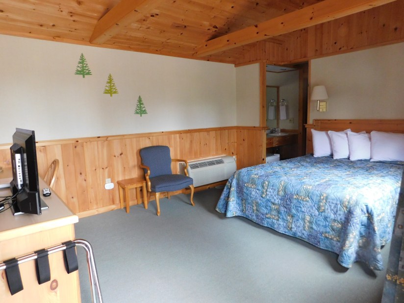 Wiscasset Woods Lodge room with knotty pine interior