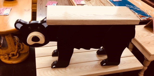 Wooden bear table made at the Prison Store in Thomaston. Inmates learn woodworking skills to help them find work after release.
